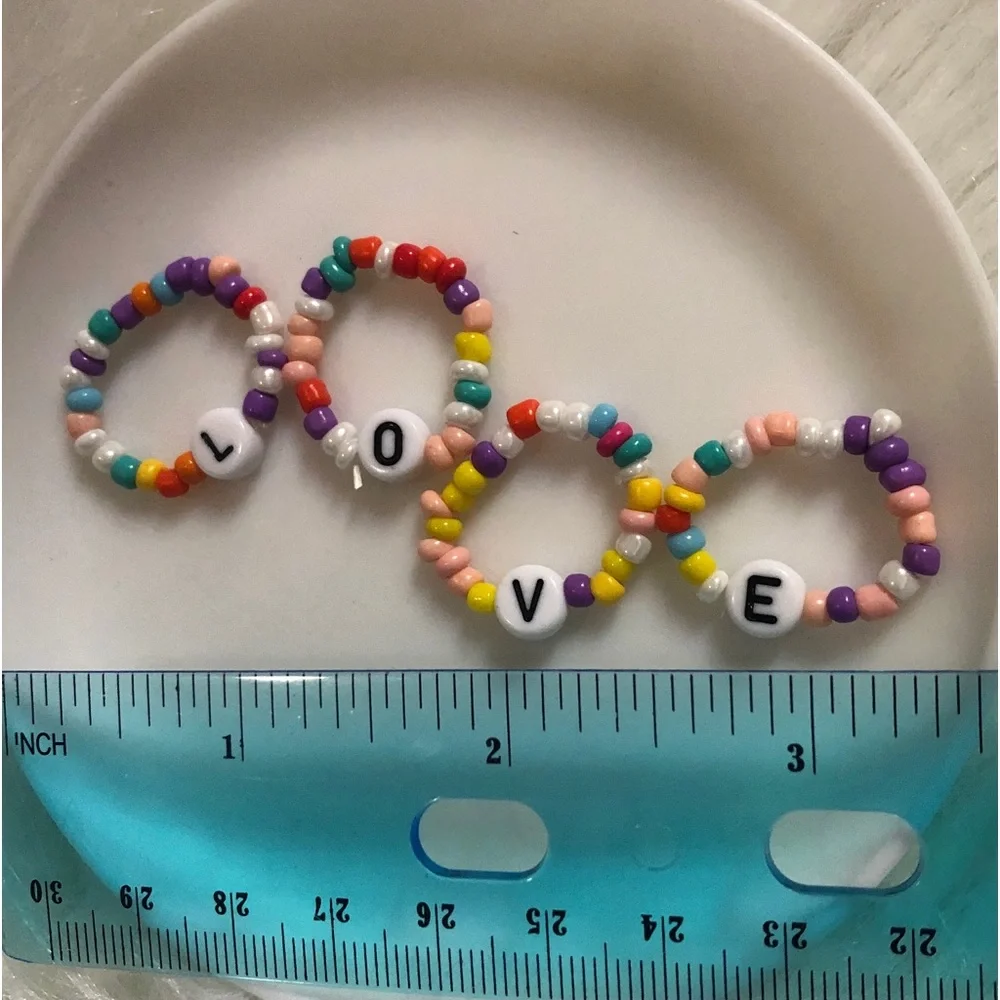 Four beaded LOVE rings